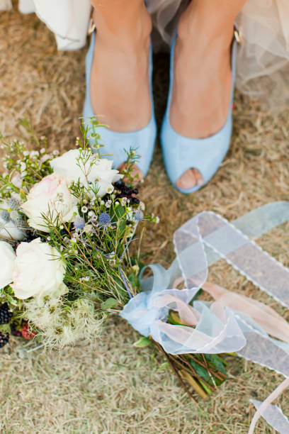istock wedding bouquet and shoes 660489202