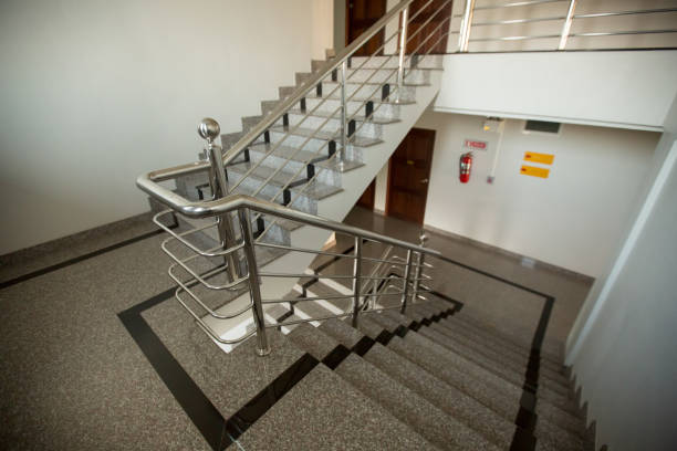 istock indoor granite Staircase With stainless steel Handrail 660489514