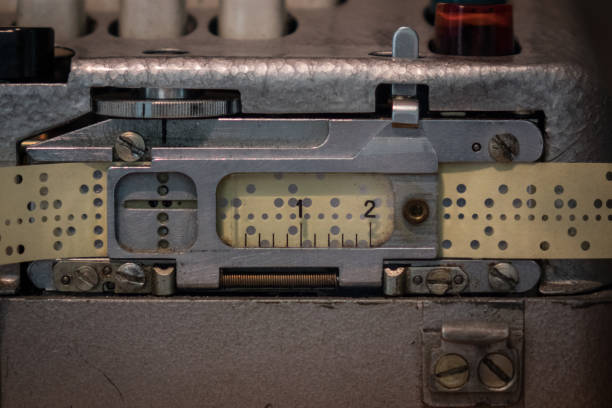 istock The perforated paper tape of an old device 660493644