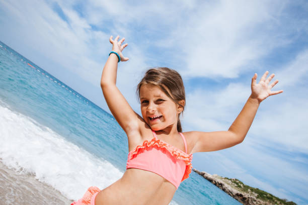 istock Little Girl at the Beach 660493884