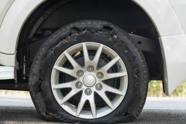 istock car Tire broken  on the way 660503626