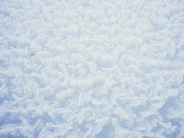 istock Stucture of crystal snow surface from very close distance. 660503852