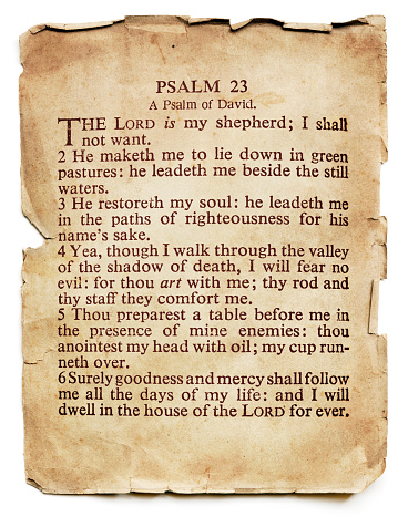 Psalm 23 on old paper, isolated on white.