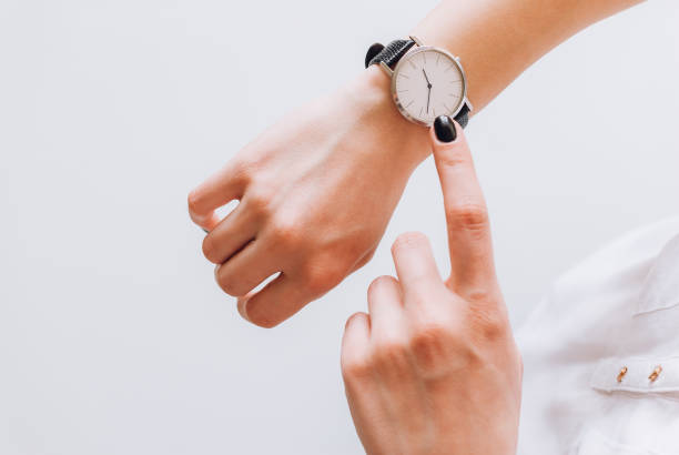 istock Time check on a woman watch 660512836