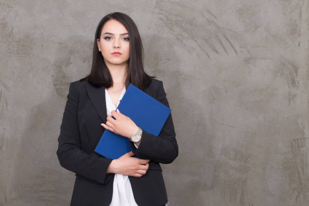 istock Young woman holding job application 660515736