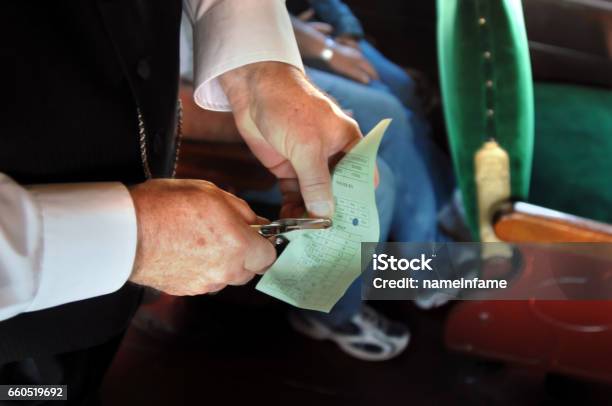 Conductor Punches Ticket Stock Photo - Download Image Now - Ticket, Transport Conductor, Punching