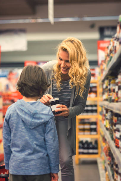 istock Mother and Son In A Supermarket 660533438