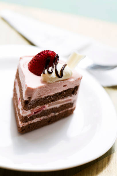 istock Delicious Strawberry shot cake on plate 660537822