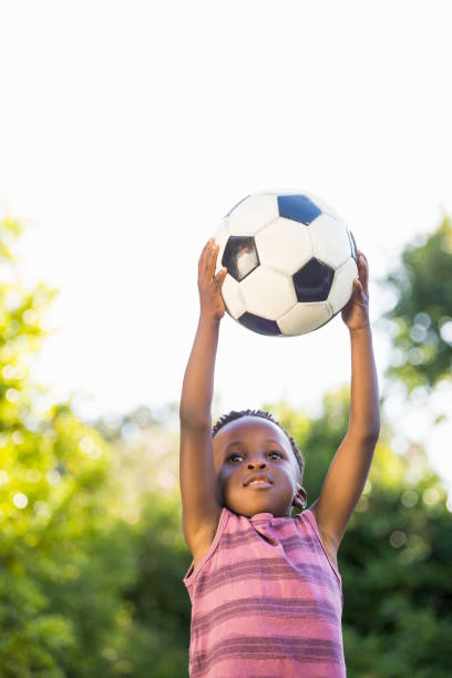 istock Boy is catching a soccer ball 660541176