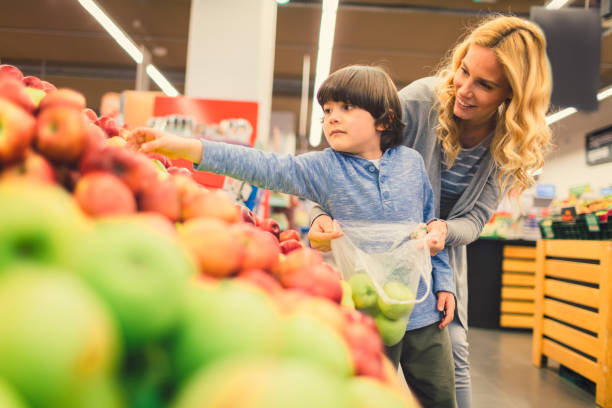istock Mother and Son In A Supermarket 660547214