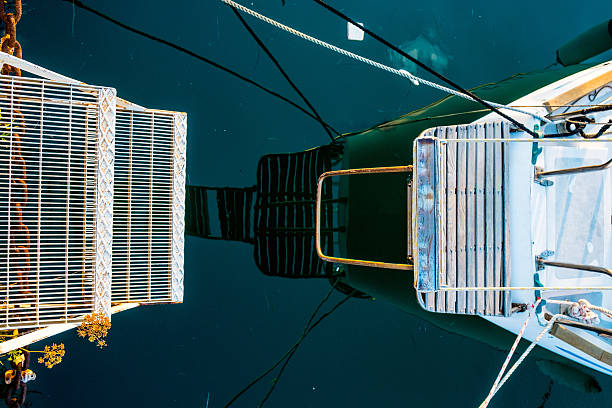 istock Close-Up Of Cropped Boat With Reflection 660547507