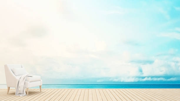 istock armchair on terrace sea view 660554082