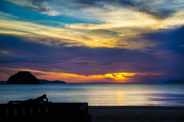 istock Man sleeping on the sun with beautiful sky 660554424
