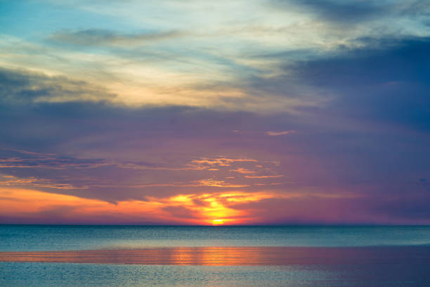 istock beautiful sunset and beautiful cloud over sea in sunset 660554434