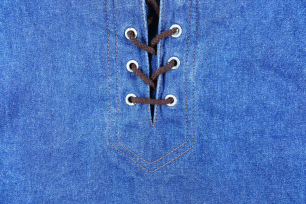 istock blue jeans texture with tied rope 660559458