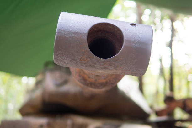 istock Front of old  gun war tank selective focus 660560566