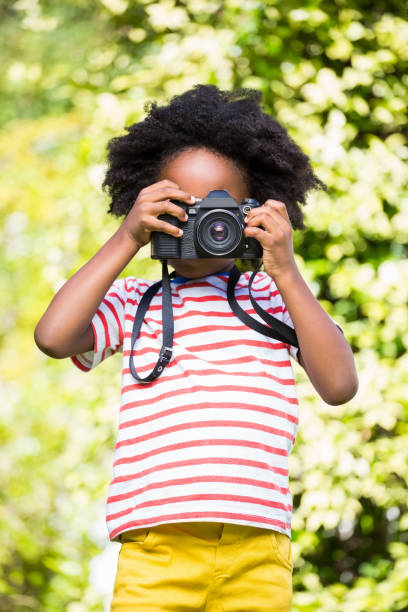 istock Boy is taking pictures 660566918