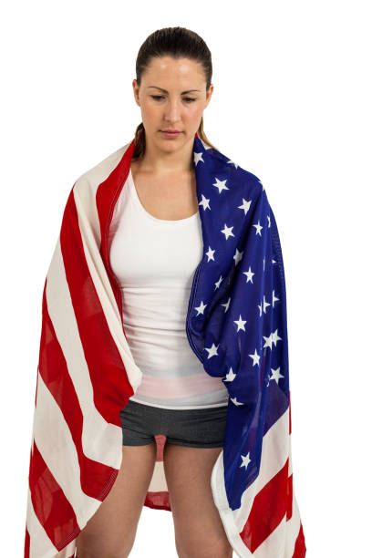 istock Athlete with american flag wrapped around his body 660569954