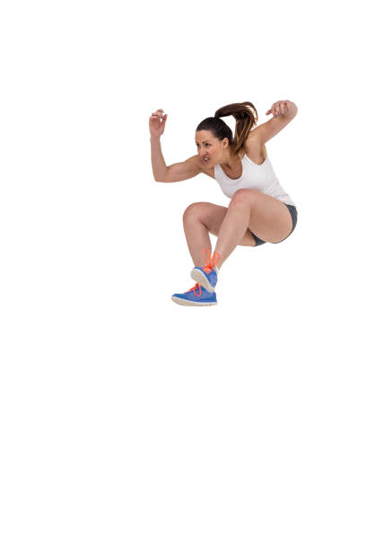 istock Athletic woman running on white background 660570036