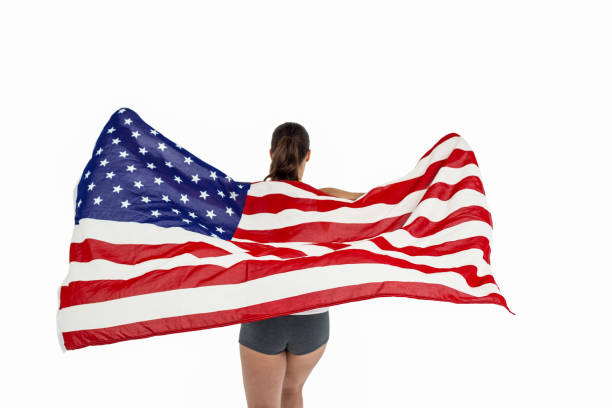 istock Athlete posing with american flag after victory 660572660