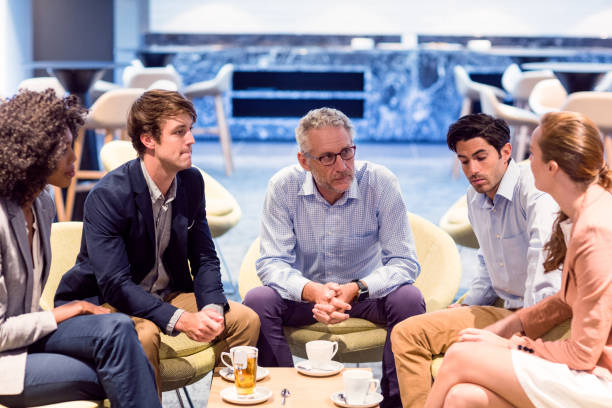 istock Business people having a discussion in cafeteria 660573816