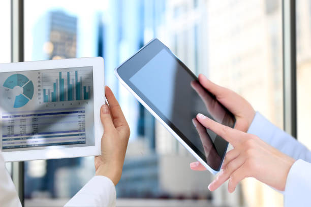 istock Business colleagues working and analyzing financial figures on a graphs 660583606
