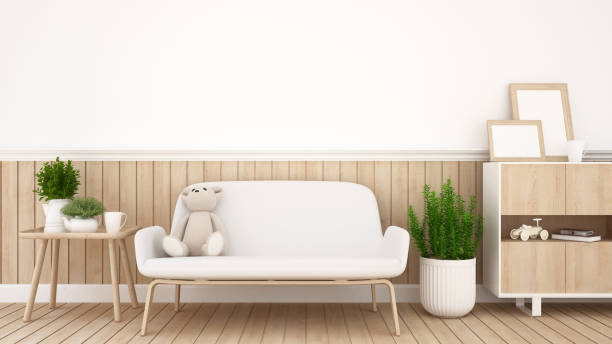 istock teddy bear on sofa in living room or coffee shop 660586230