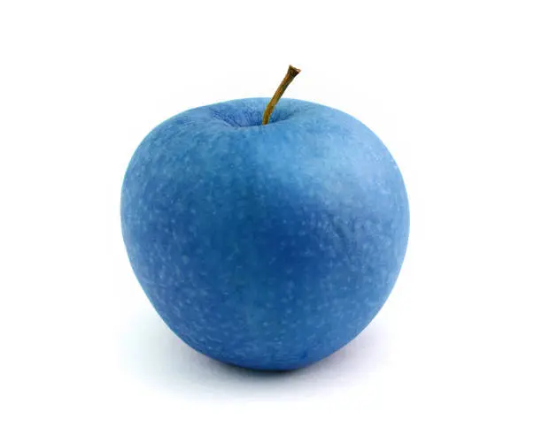 Blue apple isolated over white background