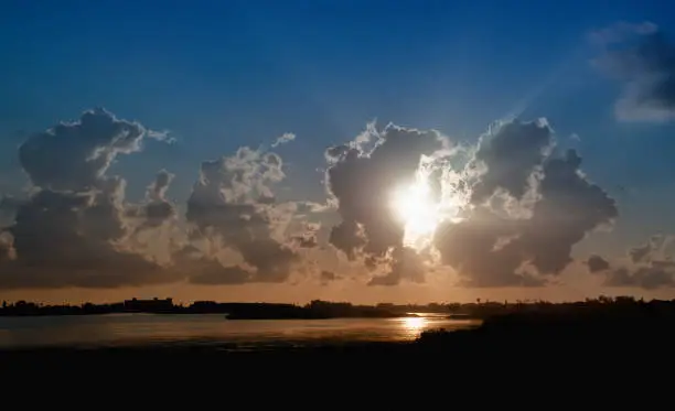 Sunset, blue, orange, clouds, taken in Florida, near the Skyway Bridge, Gulf Coast.