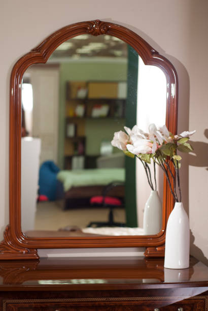 istock A large mirror in a wooden frame, 660601972