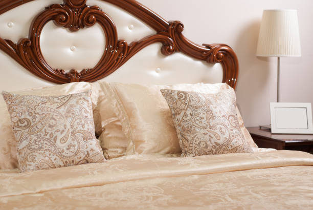 istock Classic double bed with wooden decor, 660601976