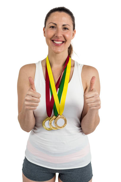 istock Athlete posing with gold medals around his neck 660602164