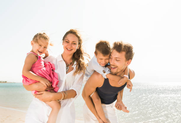 istock Young happy family having fun in summer day. 660606188