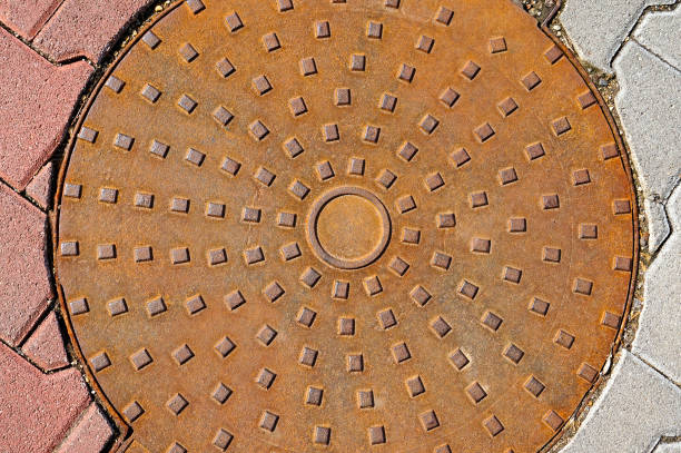 istock Cover of the sewage hole 660607502