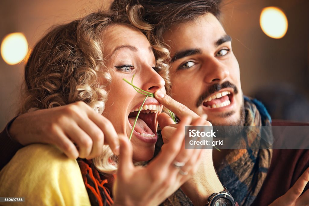 Couple enjoying restaurant Young couple enjoying restaurant in the morning. Adult Stock Photo