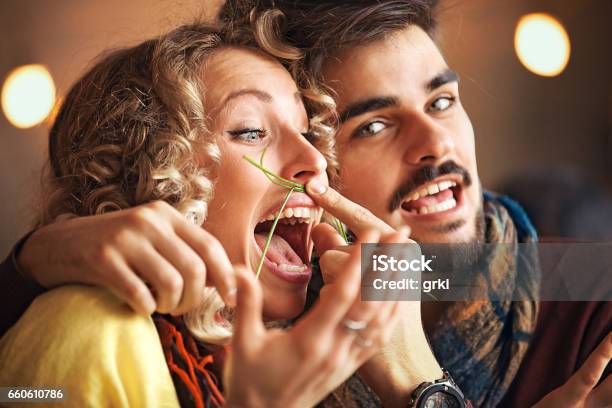 Couple Enjoying Restaurant Stock Photo - Download Image Now - Adult, Bar - Drink Establishment, Boyfriend