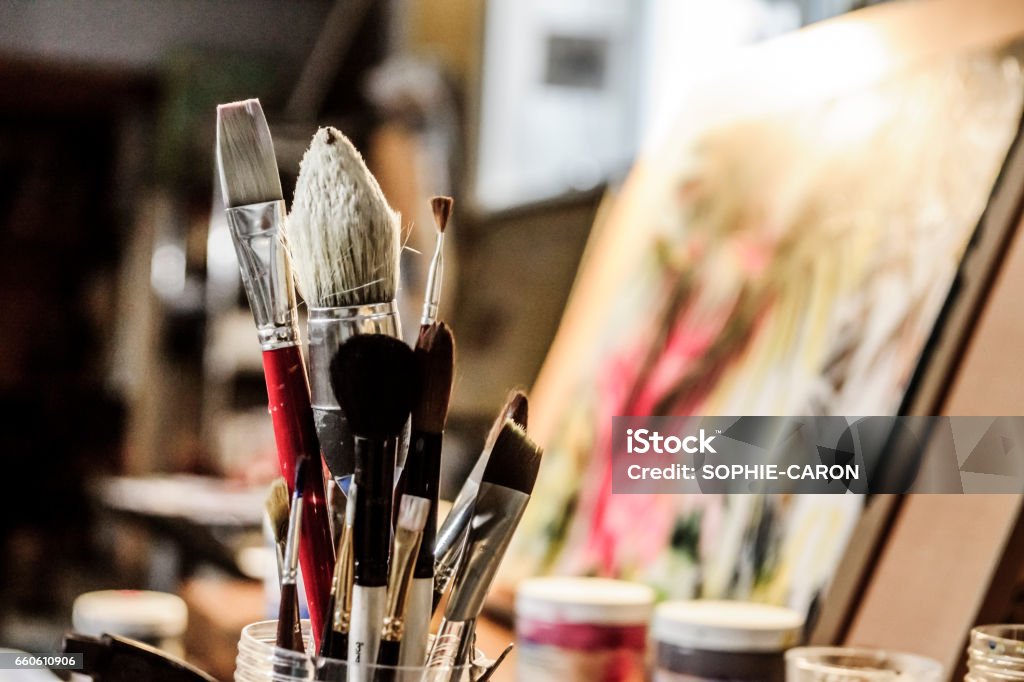 Artist's brush Several brushes of different shape and size. In a plastic jar 2015 Stock Photo