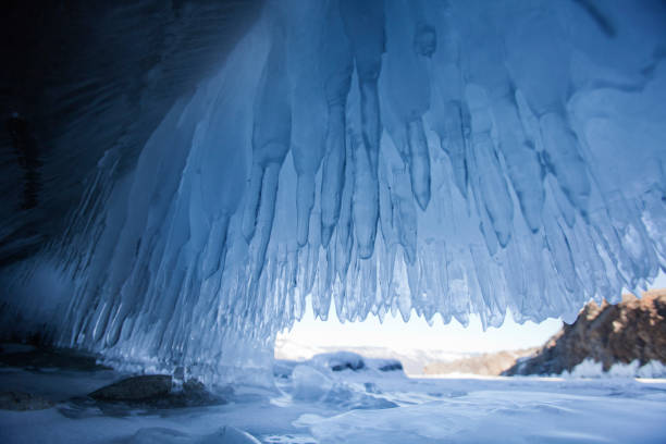 istock ice cave, Lake Baikal, Oltrek island. Winter 660621488