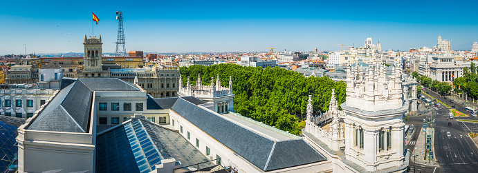 View from the roof of the Palacio de Comunicaciones overlooking the busy Plaza de Cibeles towards the heart of central Madrid, Spain's vibrant capital city.