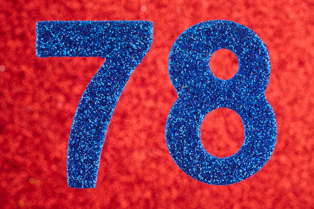 istock Number seventy-eight blue color over a red background. Anniversary. 660624778