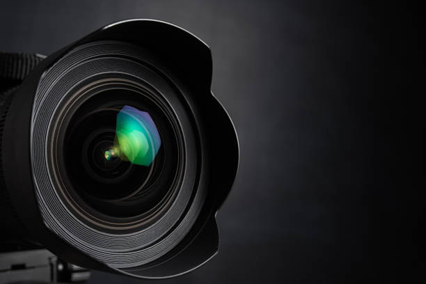 istock digital photo camera lens on black background 660630916