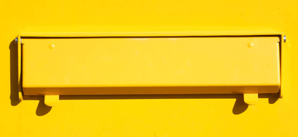 Yellow mailbox stock photo