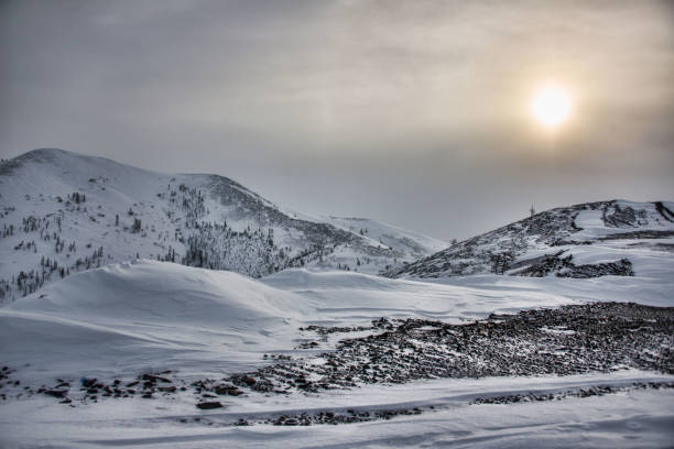 istock Low sun on the pass Kolyma road 660634984