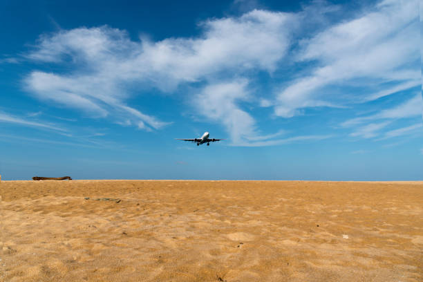 istock Airplane landing at Phuket airport 660635542