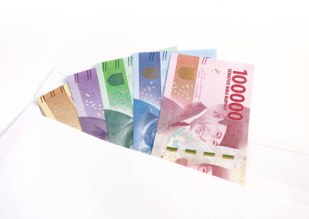 istock Indonesia rupiah money on white envelope 660643354