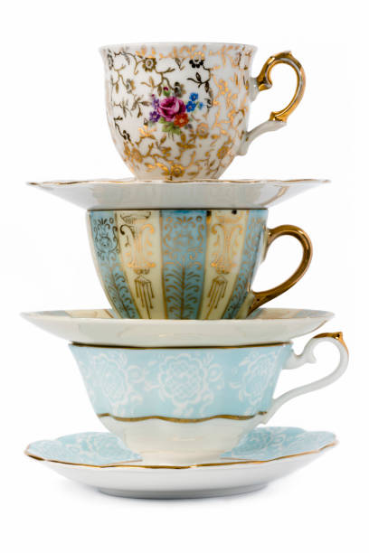 Vintage Tea Cups Decorated antique porcelain tea cups with  saucers. tea cup stock pictures, royalty-free photos & images