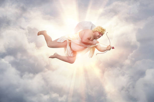 Funny overweight cupid Funny overweight cupid aiming with the arrow of love with copy space cherub stock pictures, royalty-free photos & images