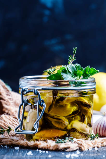 istock Mussels in olive oil with lemon and herbs 660647818