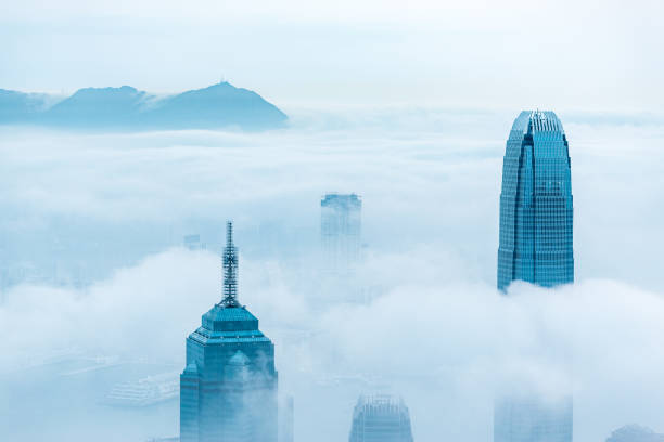 istock Clouds rolling over Hong Kong Victoria Harbor at misty season 660650398