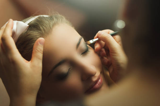 istock Woman at the Make up artist 660654652